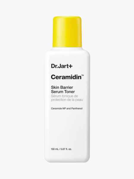 Dr. Jart+ Ceramidin Skin Barrier Serum Toner in white bottle with yellow cap on gray background